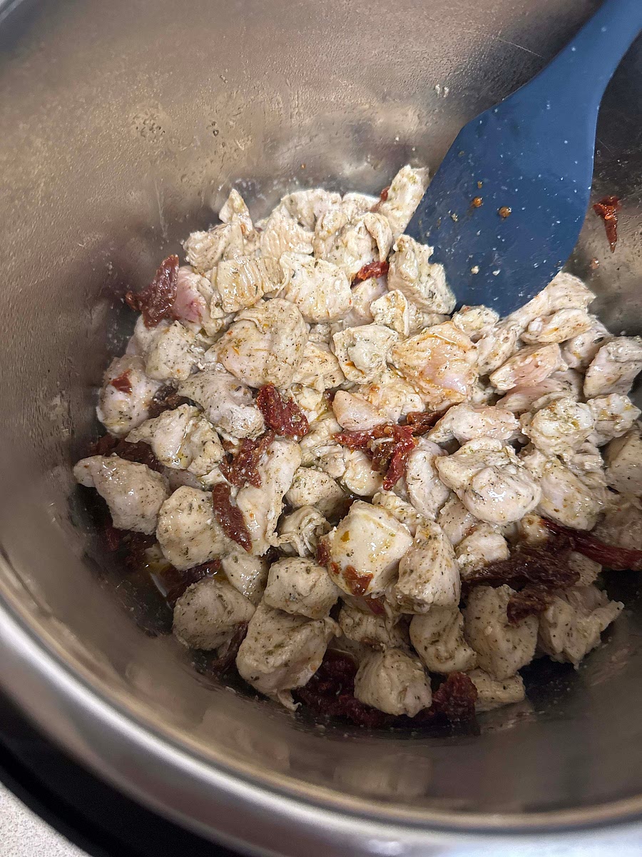 Add the chopped sun-dried tomatoes. Sauté for one more minute.