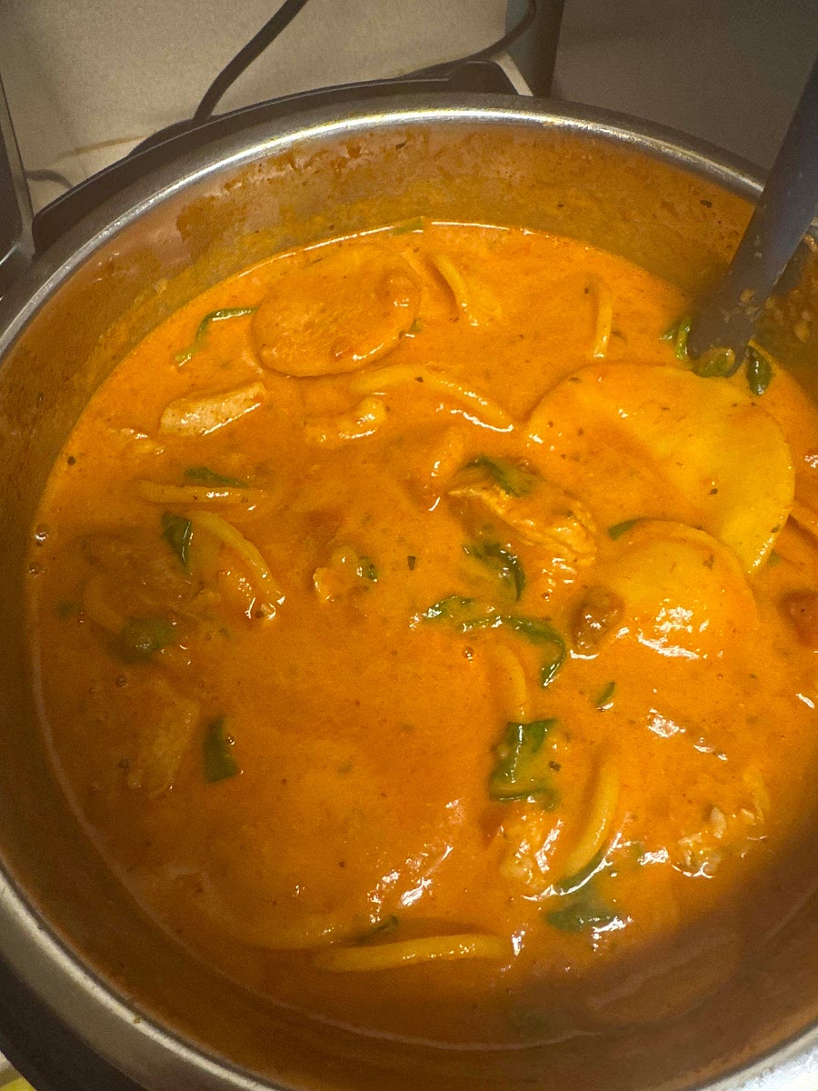 Turn off the Instant Pot. Serve the ravioli immediately, topped with grated Parmesan cheese if you like.