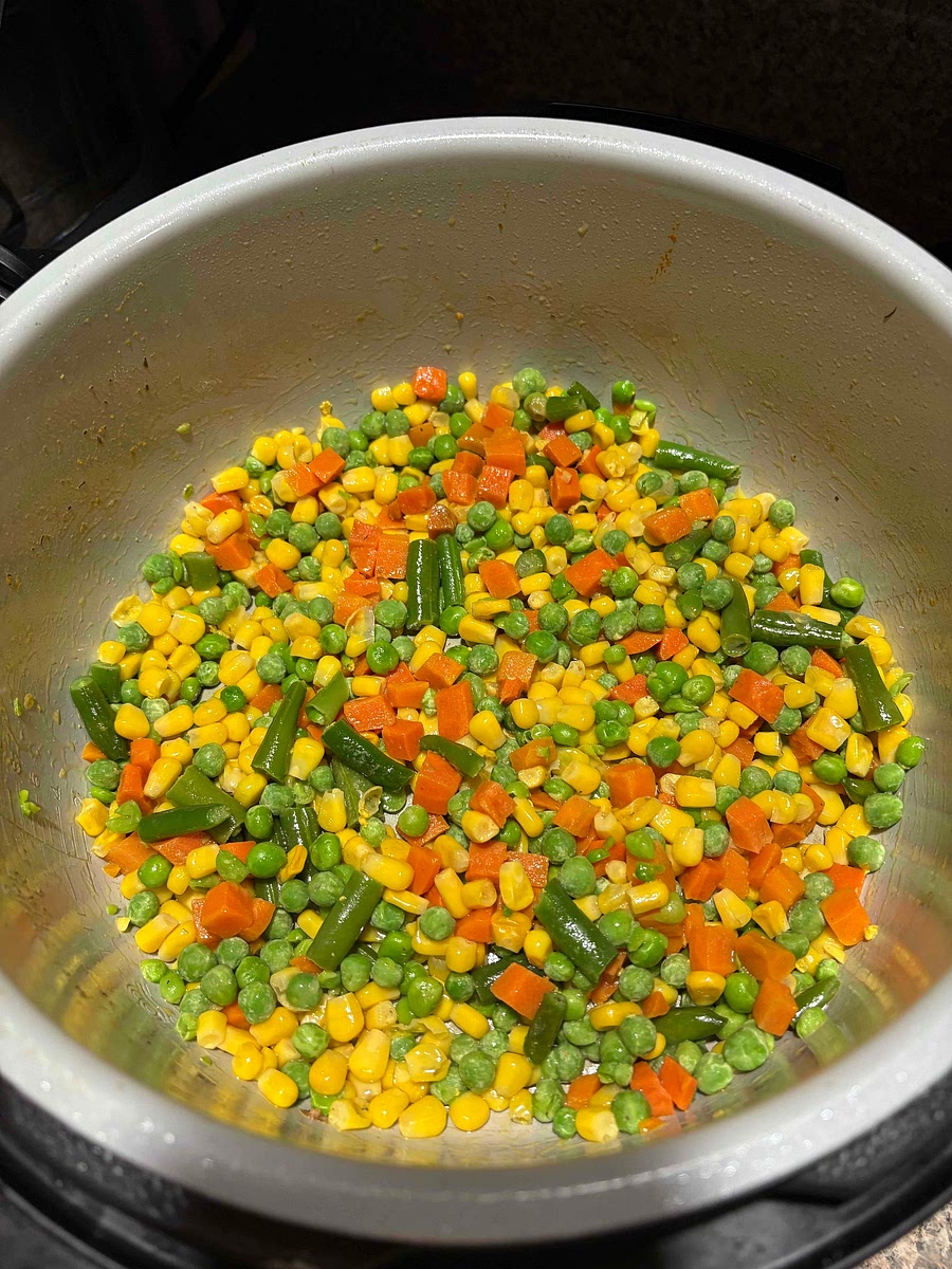 Cut the vegetables, then sauté the vegetables in butter or bacon fat until soft.