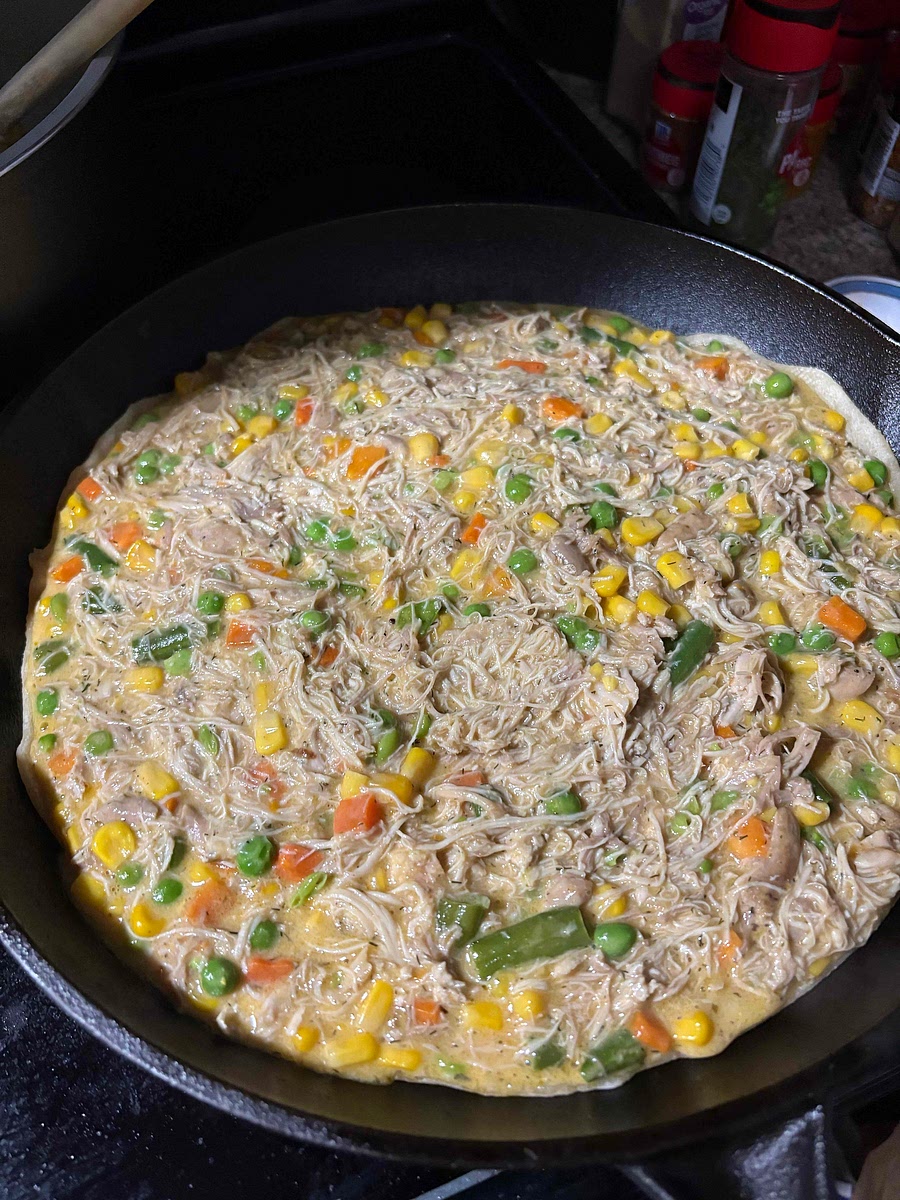 Add filling, make sure to spread evenly.