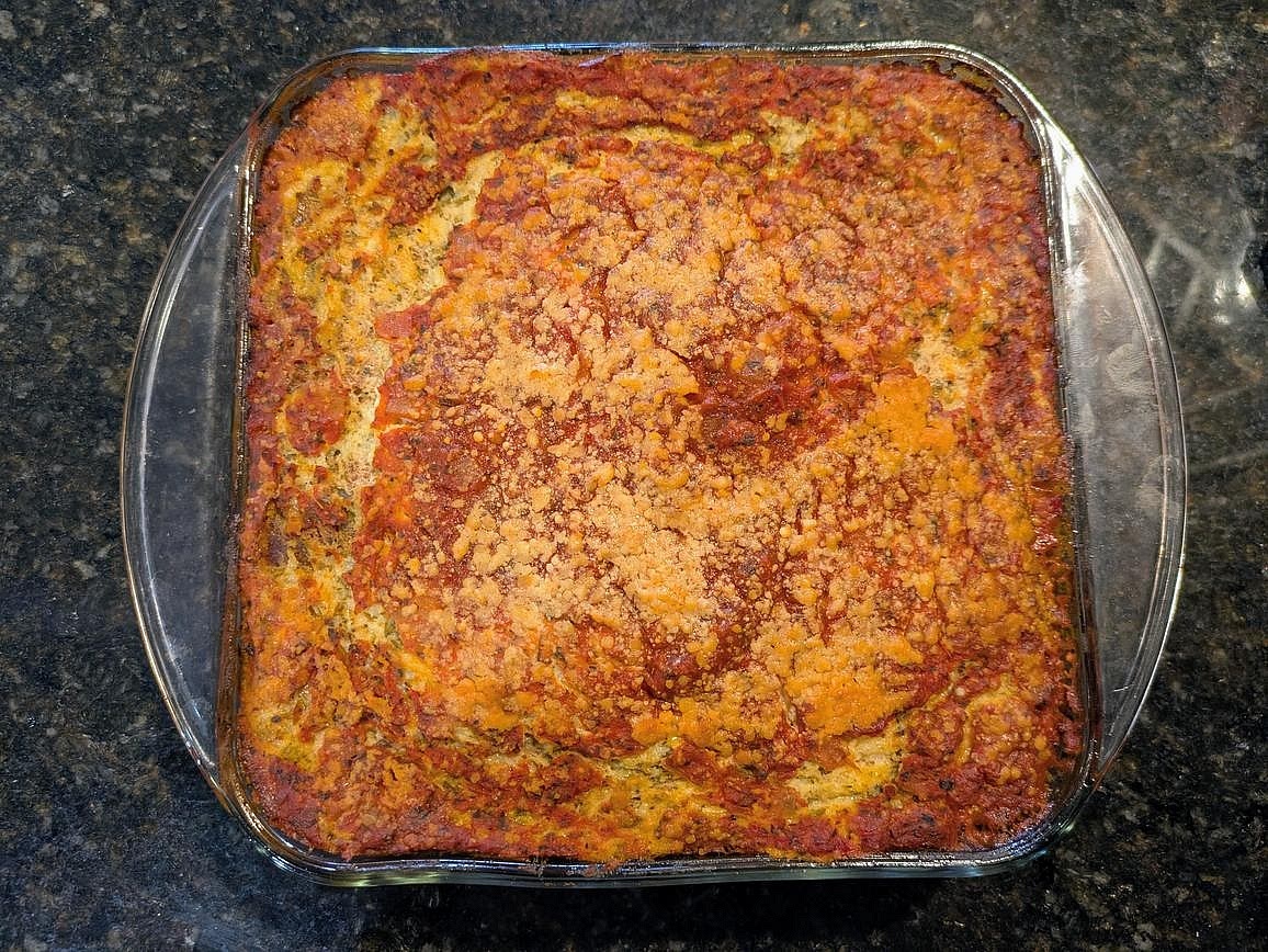 Bake - Cover with aluminum foil, and bake at 400F for about 45 minutes, or until the cheese is bubbly. Remove the foil, and bake for an additional 15 minutes. Garnish with parsley, and let it cool for 10 minutes before cutting and serving