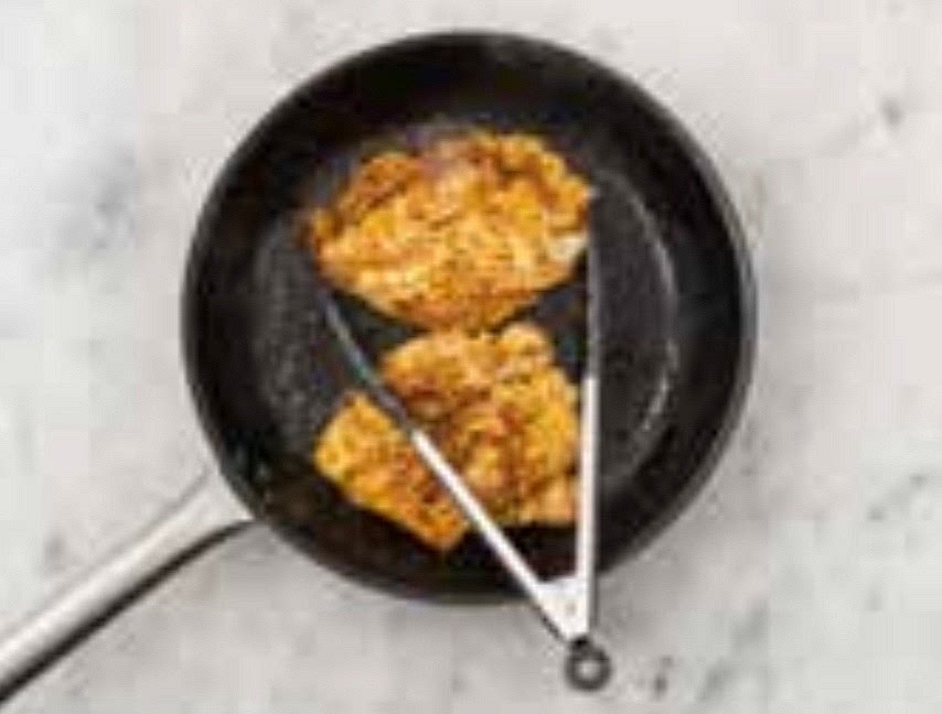 Put the lime zest and remaining Indonesian style spice mix into a medium bowl. Season with salt and pepper, mix together and add the chicken breasts. Turn to coat evenly. Heat a drizzle of oil in a large frying pan on medium-high heat. Once the pan is hot, lay in the chicken, turn the heat down to medium and cook until golden brown, 7-8 mins each side. IMPORTANT: The chicken is cooked when no longer pink in the middle. Once cooked, transfer the chicken to a board, cover with foil and rest for a couple of mins.