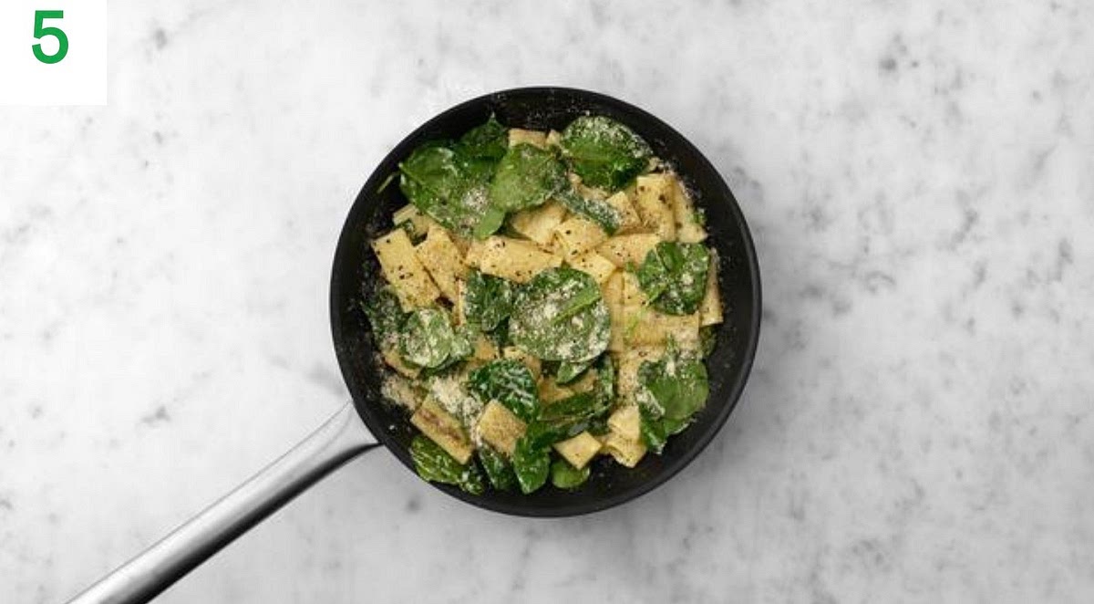 a) Once cooked, drain the pasta in a colander, then add to the pan of creamy sauce along with the peas and heat through for 1-2 mins. b) Add the spinach to the pan a handful at a time until wilted and piping hot, 1-2 mins. c) Stir through the cheese, then taste and season with salt and pepper if needed. Add a splash of water if you feel it needs it.