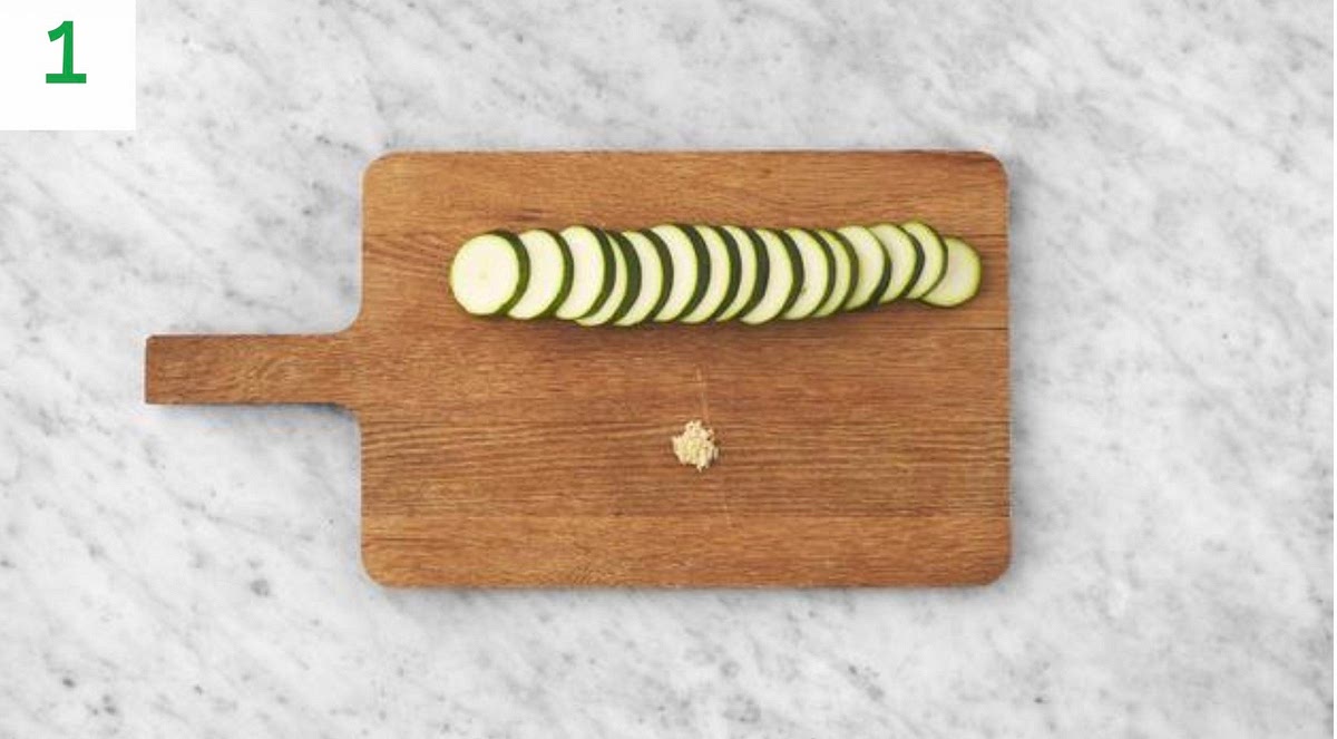 a) Bring a large saucepan of water to the boil with ½ tspsalt for the tortelloni.
b) Trim the courgette and slice into 1cm thick rounds.
c) Peel and grate the garlic (or use a garlic press).