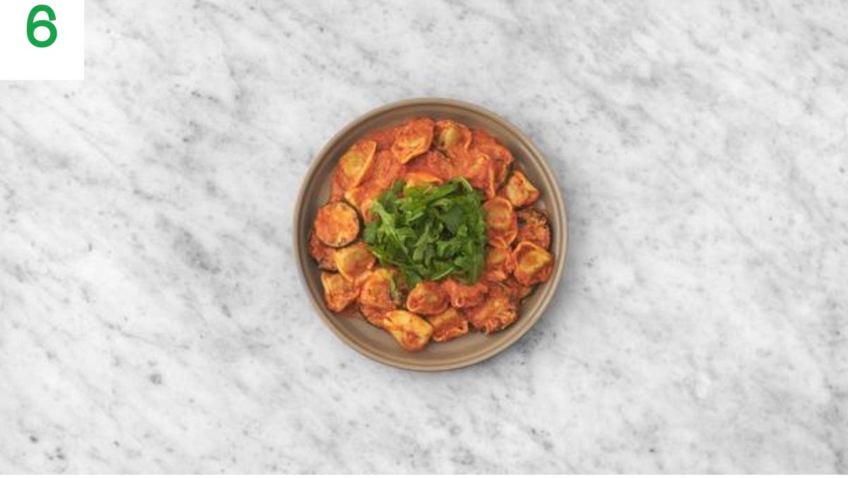 a) Share the pasta between serving bowls.
b) Top with a handful of rocket. Drizzle a little olive oil
over the leaves to finish.