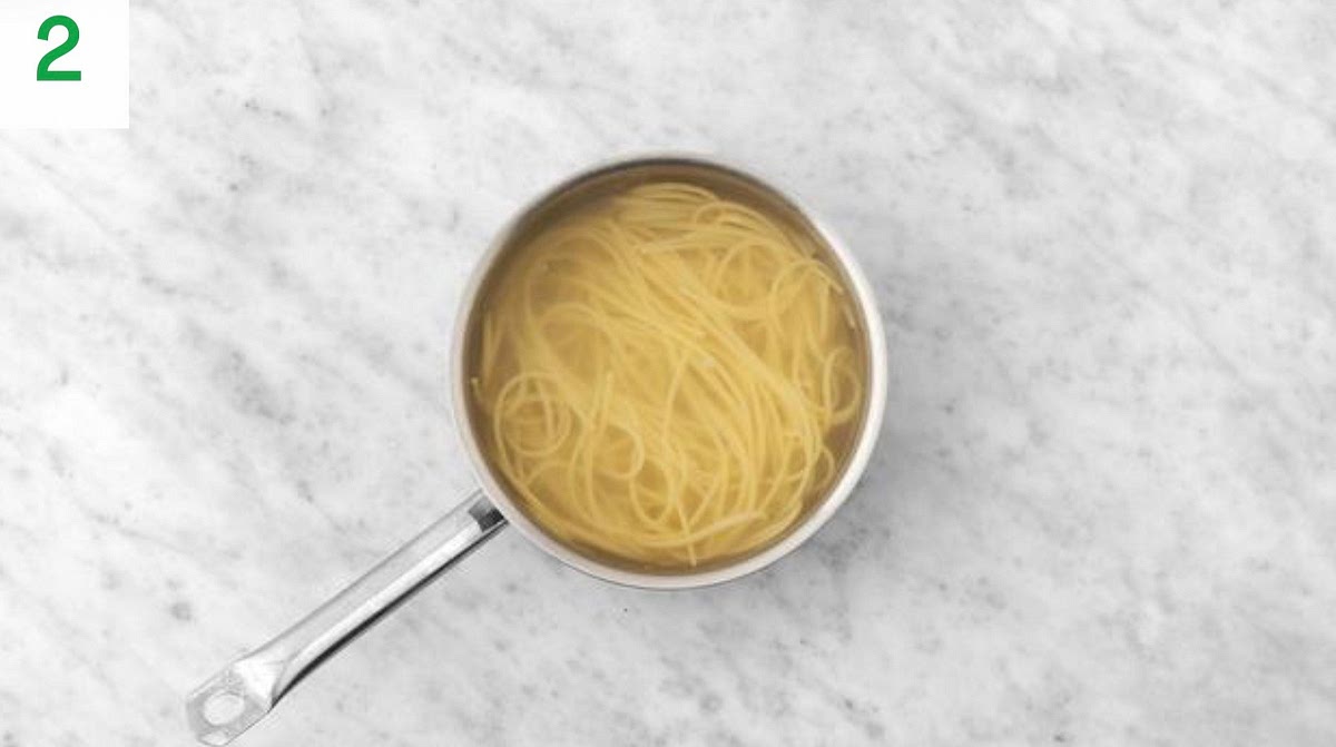 Pour the boiled water from your kettle into a large saucepan with ½ tsp salt on high heat.
Add the linguine and bring back to the boil. Cook until tender, 12 mins.