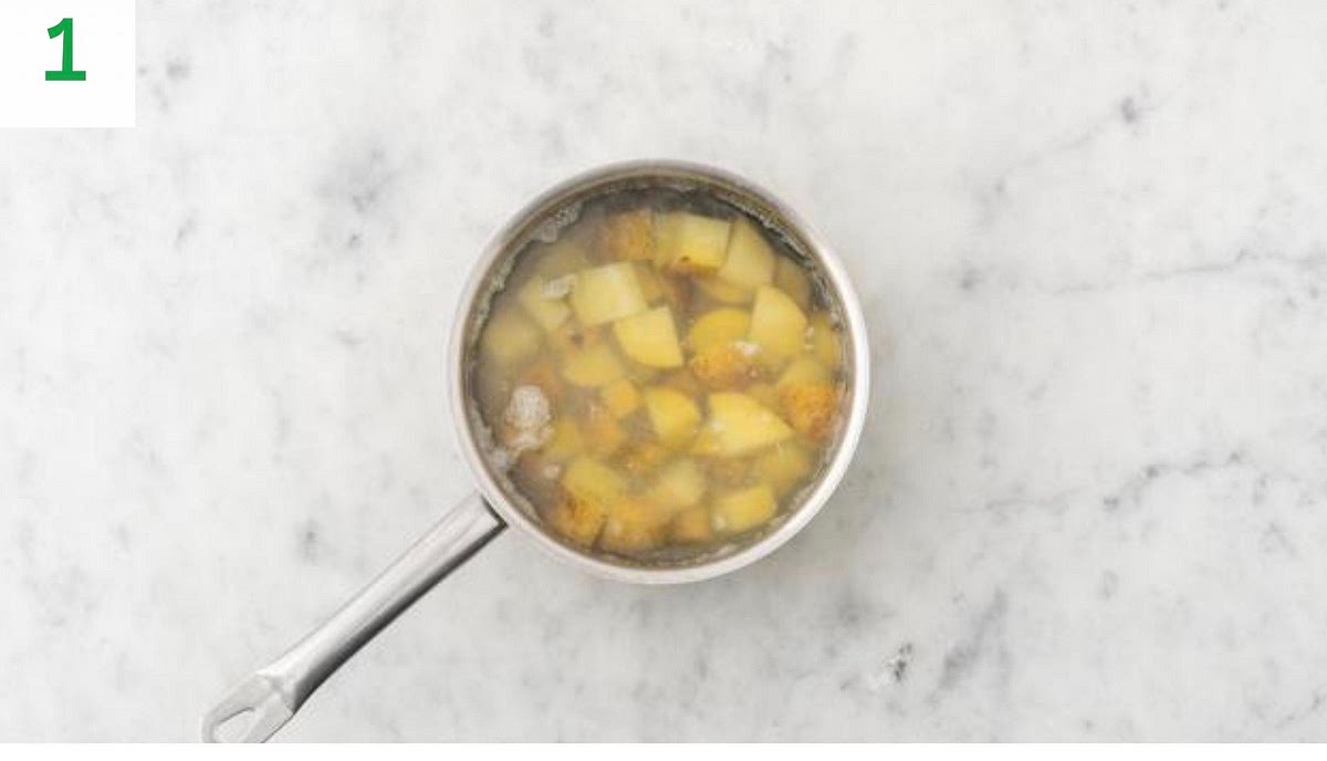Bring a large saucepan of water with ½ tsp salt to the boil.
Chop the potatoes into 2cm chunks (peel first if you prefer).
When boiling, add the potatoes to the water and cook until you can easily slip a knife through, 15-20 mins.