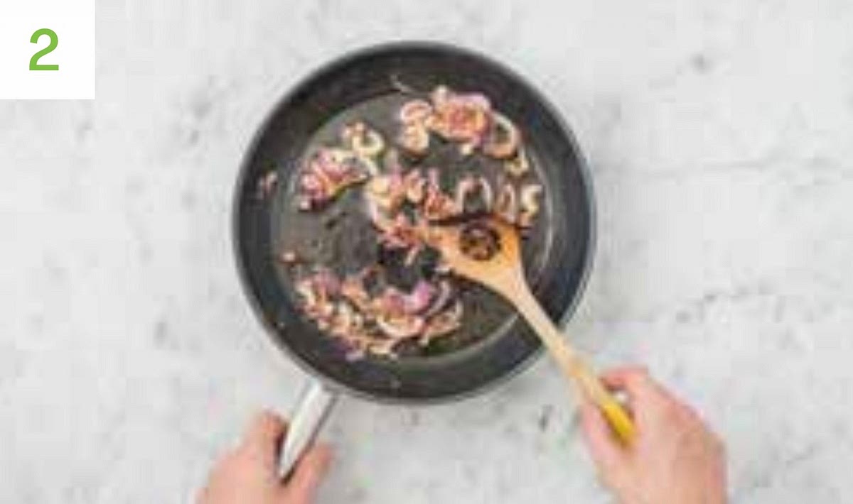 Meanwhile, halve, peel and thinly slice the red onion. Heat a drizzle of oil in a large pan on medium heat. Once hot, add the onion and season with salt. Stir and cook until soft and caramelised, 15-20 mins. Stir occasionally and adjust the heat if necessary. When soft, transfer to a bowl and cover to keep warm - you’ll add it to the potatoes later.