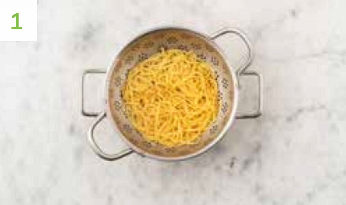 Bring a large saucepan of water to the boil with 1/2 tsp salt for the linguine. Peel and grate the garlic (or use a garlic press).
When boiling, add the linguine to the water and bring back to the boil. Cook until tender, 12 mins.
Once cooked, drain in a colander and pop back in the pan. Drizzle with oil and stir through to stop it sticking together.
