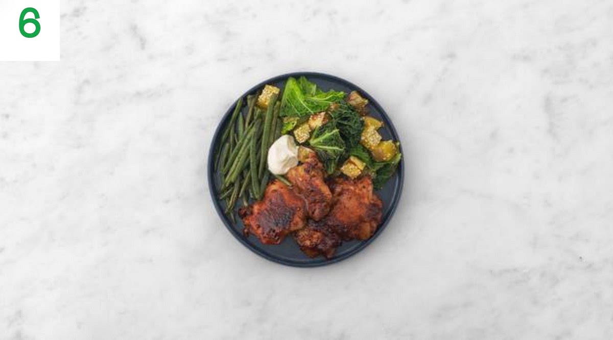 Once roasted, share the chicken between your plates.
Serve the roasted potatoes, kale and green beans alongside. Add a dollop of mayo for dipping.