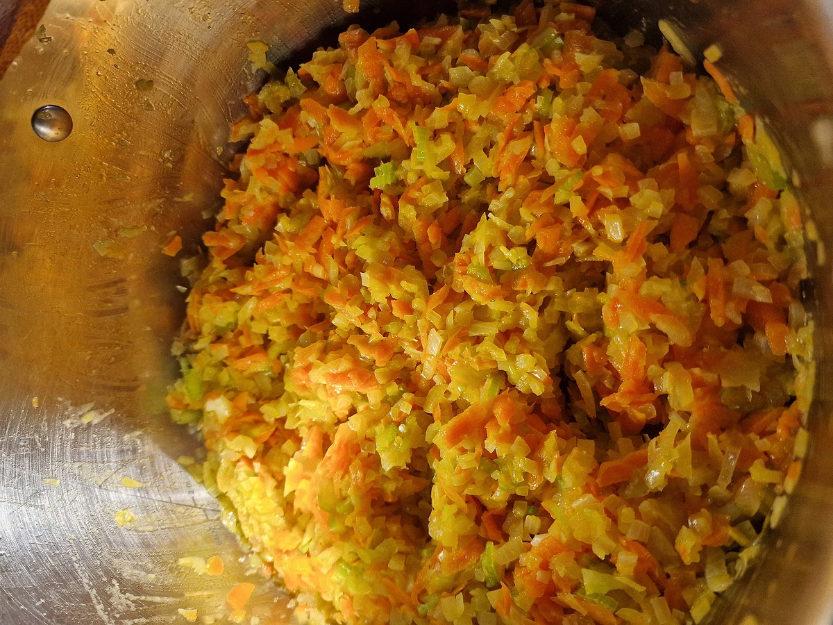 Once your onion is translucent and soft, you can add the celery and carrot and let it fry for a couple more minutes until they soften too.