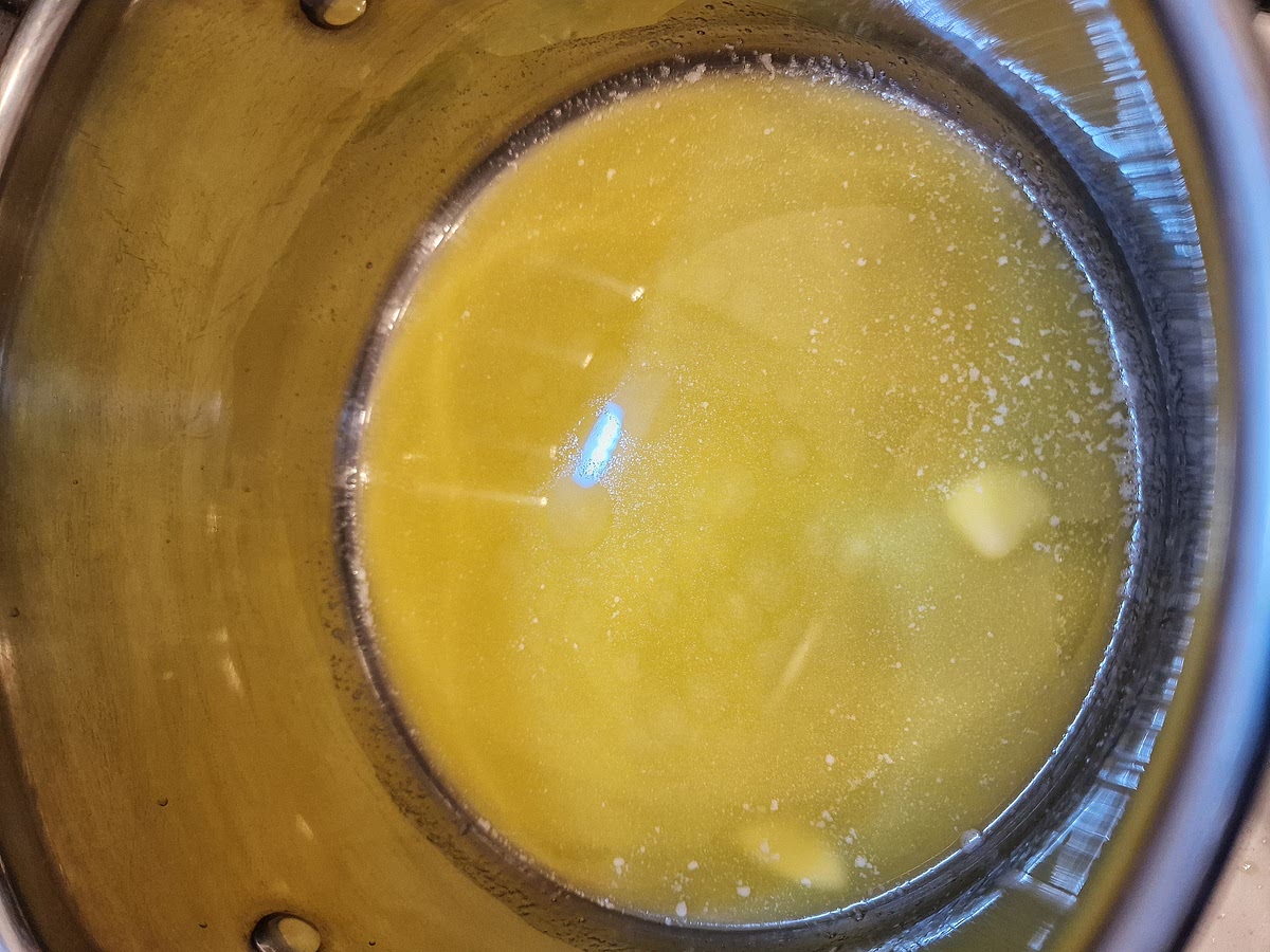 Prepare your bechamel sauce. First on low heat melt a minimum of 100g of butter. Don't let it burn.