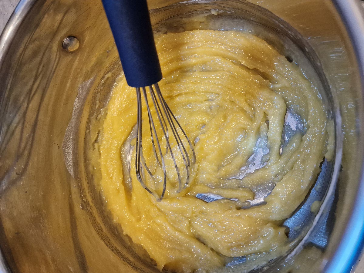 Add flour into the melted butter and stir until you get this thick paste. I use 00 flour but you can use any fine all purpose flour. The better the quality of your flour the better your bechamel will be, that goes without saying.