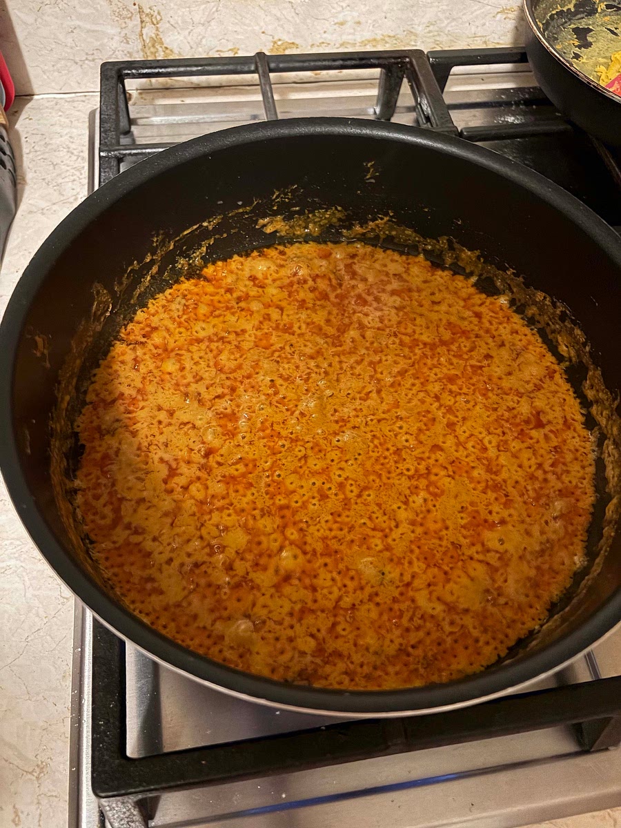 Add curry paste and cook until oily