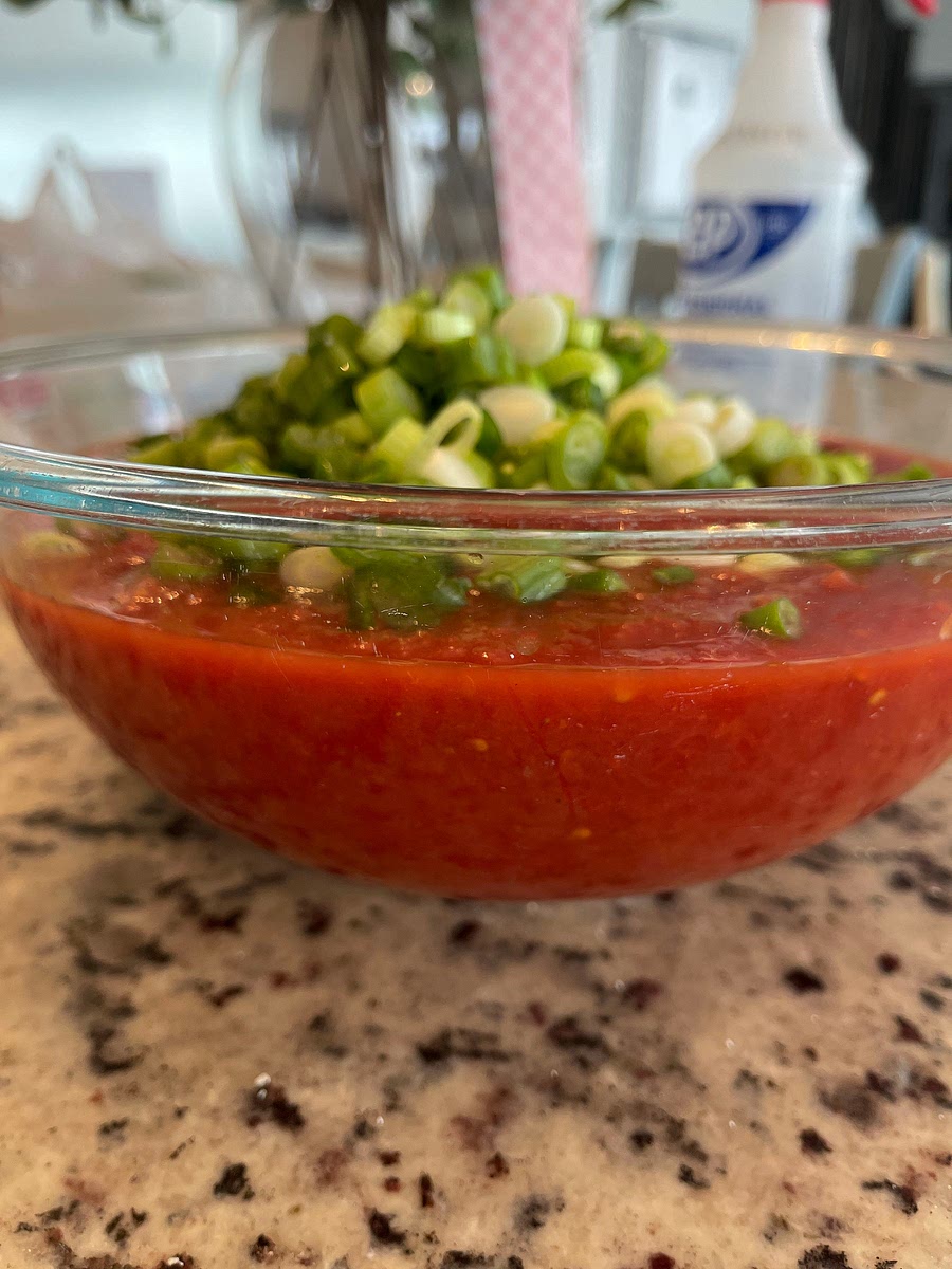 Add all your crushed tomatoes to a bowl.