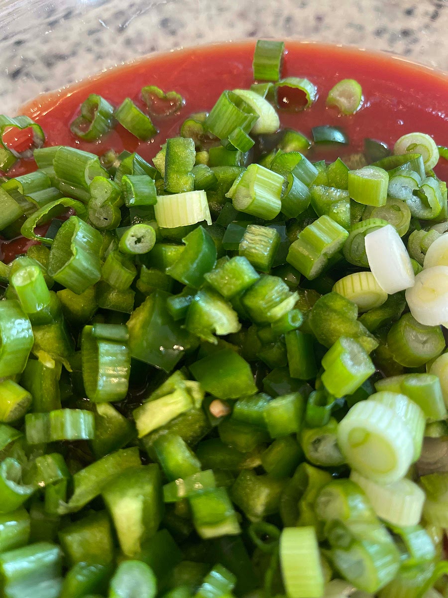 Finely dice your jalapeños and add to the bowl.