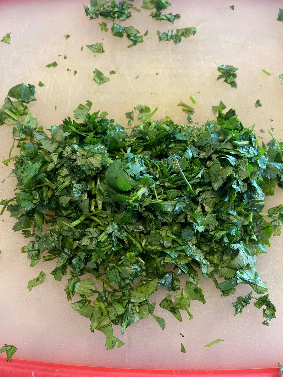 Finely chop your cilantro and add it to the bowl.