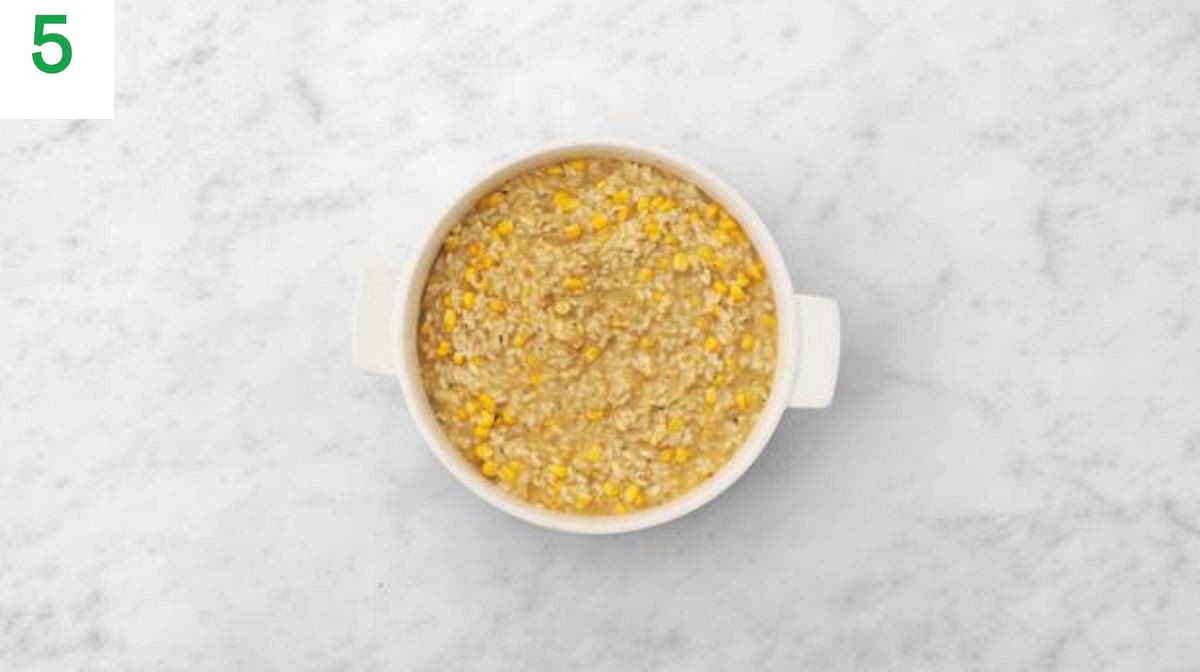 Once your risotto has finished cooking, remove from the oven and stir through the hard italian style cheese and butter. Add a squeeze of lemon juice.
Taste and season with more salt, pepper and lemon juice if needed.