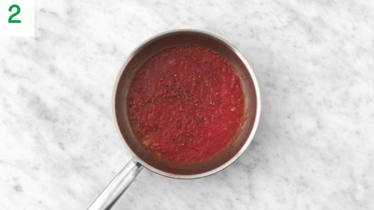 Add the red split lentils, Worcester sauce, mixed herbs, ground cinnamon, red wine stock paste and chopped tomatoes to the pan.
Stir in the sugar and water for the sauce (see pantry for both amounts). Bring to the boil, then lower the heat to medium-low and simmer until the lentils are so , 25-30 mins.
Stir occasionally to make sure the lentils aren't sticking to the bottom of the pan. Add a splash of water if it's a little dry.