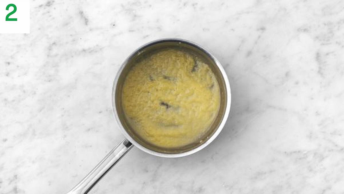 Heat the butter (see pantry for amount) in a large saucepan on medium-high heat.
Once melted, add the garlic and fry until fragrant, 1 min.
Stir in the flour (see pantry for amount). Cook until it forms a paste, 1-2 mins - you've made a roux!