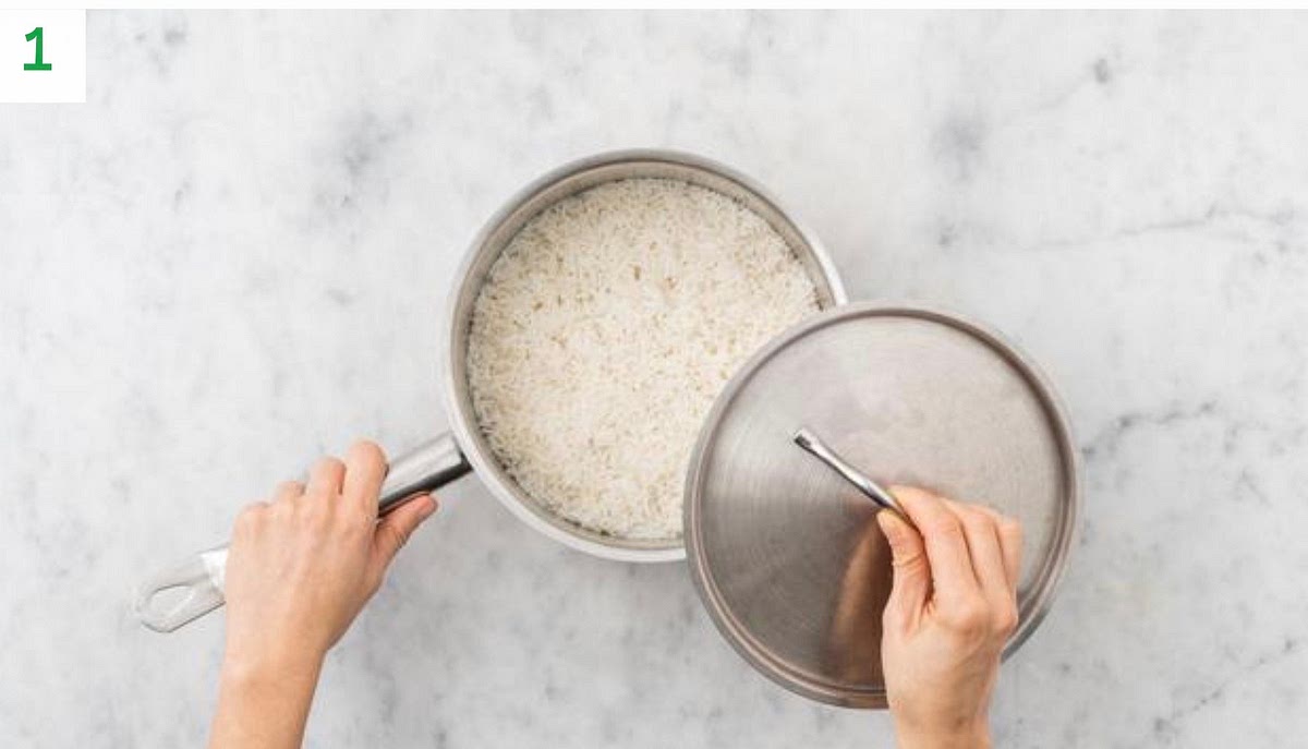 Boil a half-full kettle.
Pour the boiled water into a saucepan with ¼ tsp salt on high heat.
Boil the rice, 12-13 mins.
Once cooked, drain, pop back in the pan and cover.