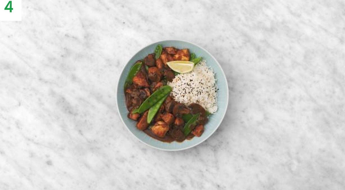 Share the rice between your bowls.
Top with the miso chicken stir-fry.
Sprinkle over the sesame seeds.
Share with any remaining lime wedges for squeezing over.