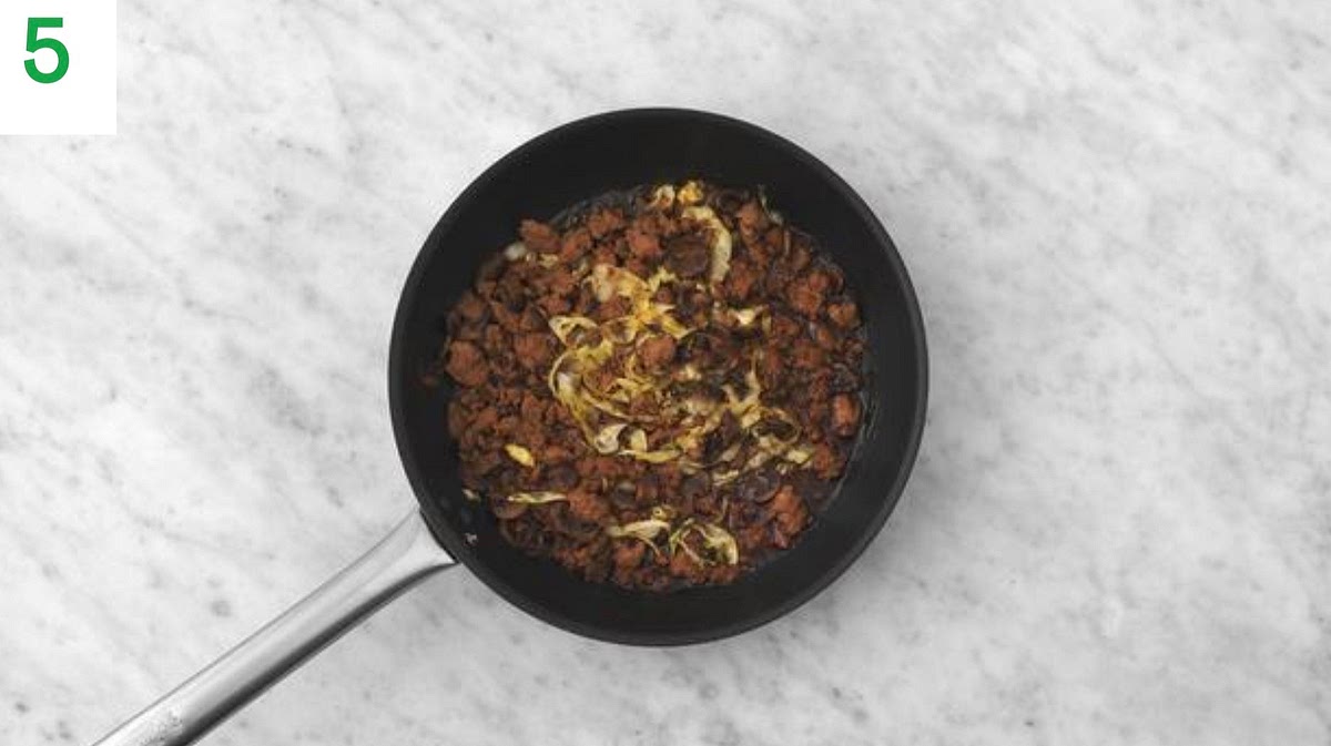 Flip the pancakes over and cook until golden and cooked through, 2-3 mins more. The pancakes will puﬀ
up slightly.
Transfer to a clean board or plate. Leave to cool slightly.
Repeat with the remaining pastry discs.
Meanwhile, when the beef has 5-7 mins remaining, add
the cabbage and cook until tender.
Taste and season with salt and pepper if you feel it needs it. Add a splash of water if it looks a little thick.