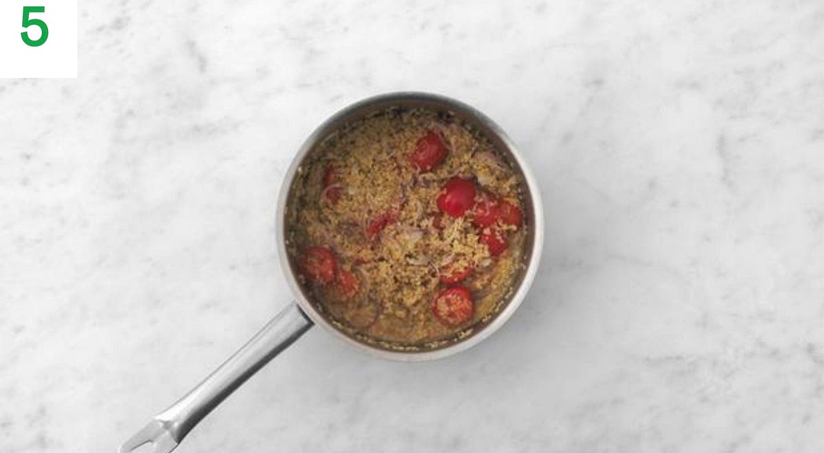 When the butternut is ready, remove the tray from the oven and drizzle over the remaining honey (see pantry for amount). Toss to coat.
Fluﬀ up the bulgur with a fork and stir through half the coriander and roasted tomatoes (discard any le ftover juices in the foil).