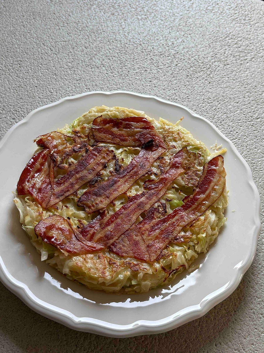 When the bottom is golden brown, flip.
Cover with a lid and cook 5–6 minutes.
Flip again and cook about 1 more minute.