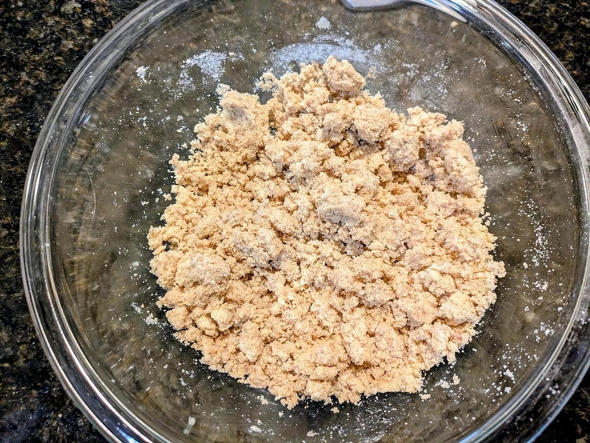 In a large bowl, mix together the base ingredients with a silicone spatula - coconut flour, cinnamon, baking powder, salt, vanilla extract, liquid monk fruit, and applesauce