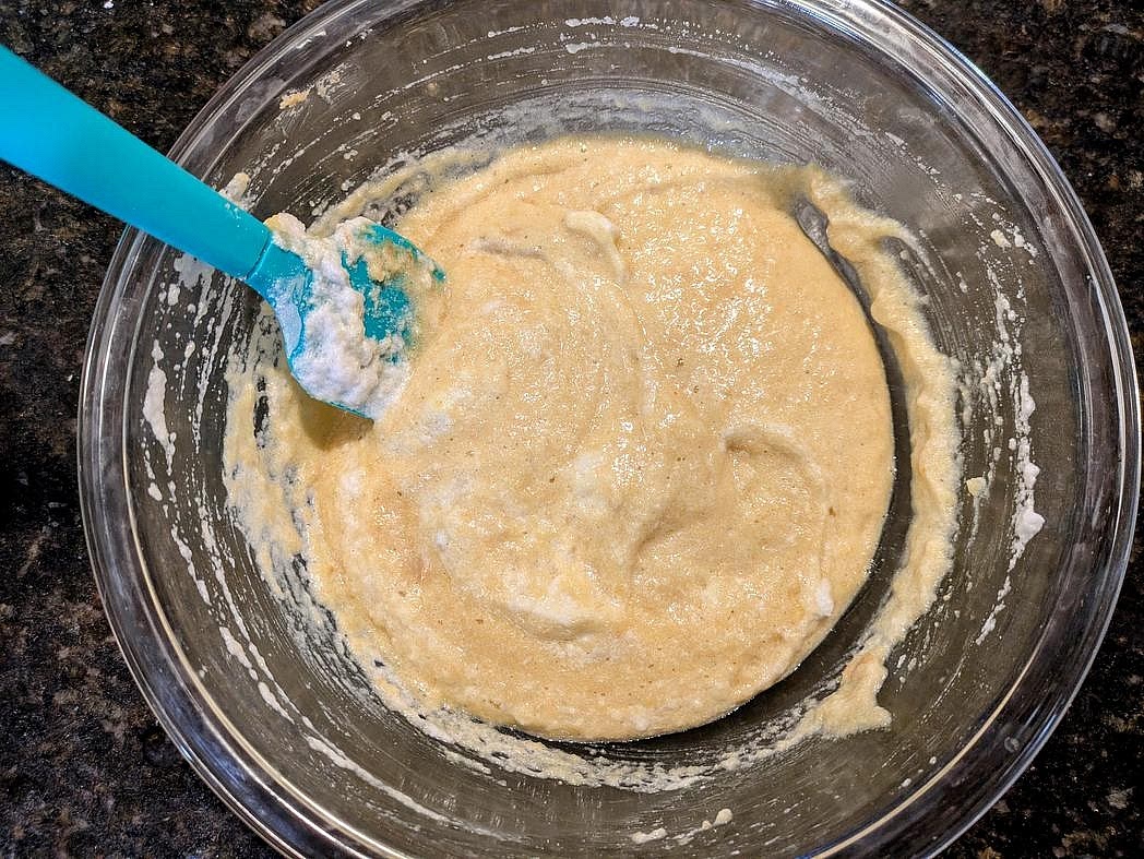 Carefully fold the egg whites into the cookie batter with a spatula