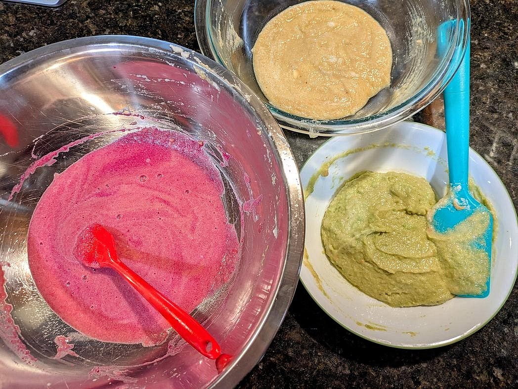 Prepare 3 smaller bowls, one for each color. For the green layer, mash an avocado with the back of a fork until smooth. For the red layer, add in your pickled beet juice. Evenly divide the batter across the 3 bowls, about 169 g each, and mix each with a silicone spatula until fully combined
