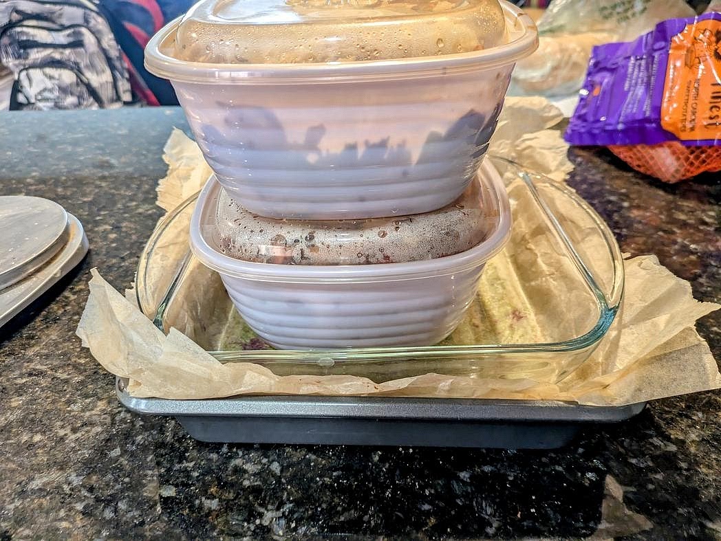 Place a piece of parchment paper on top of the green layer. Place another pan on top of the top layer of parchment, and place a weight inside. Refrigerate for at least 4 hours, or ideally overnight