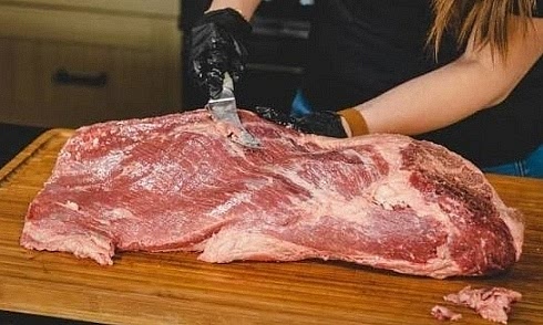 Trim: Remove hard deckle fat and silverskin; trim fat cap to a uniform 1/4 inch.