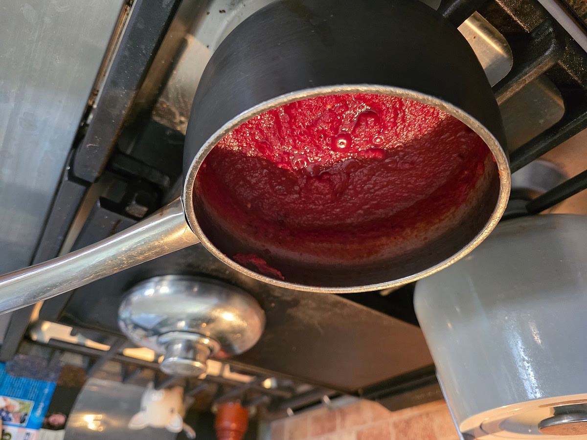 Mix contents of can with water; whisk gently over low heat until smooth. Add all other ingredients and simmer 5-10 minutes, then taste and adjust spices.