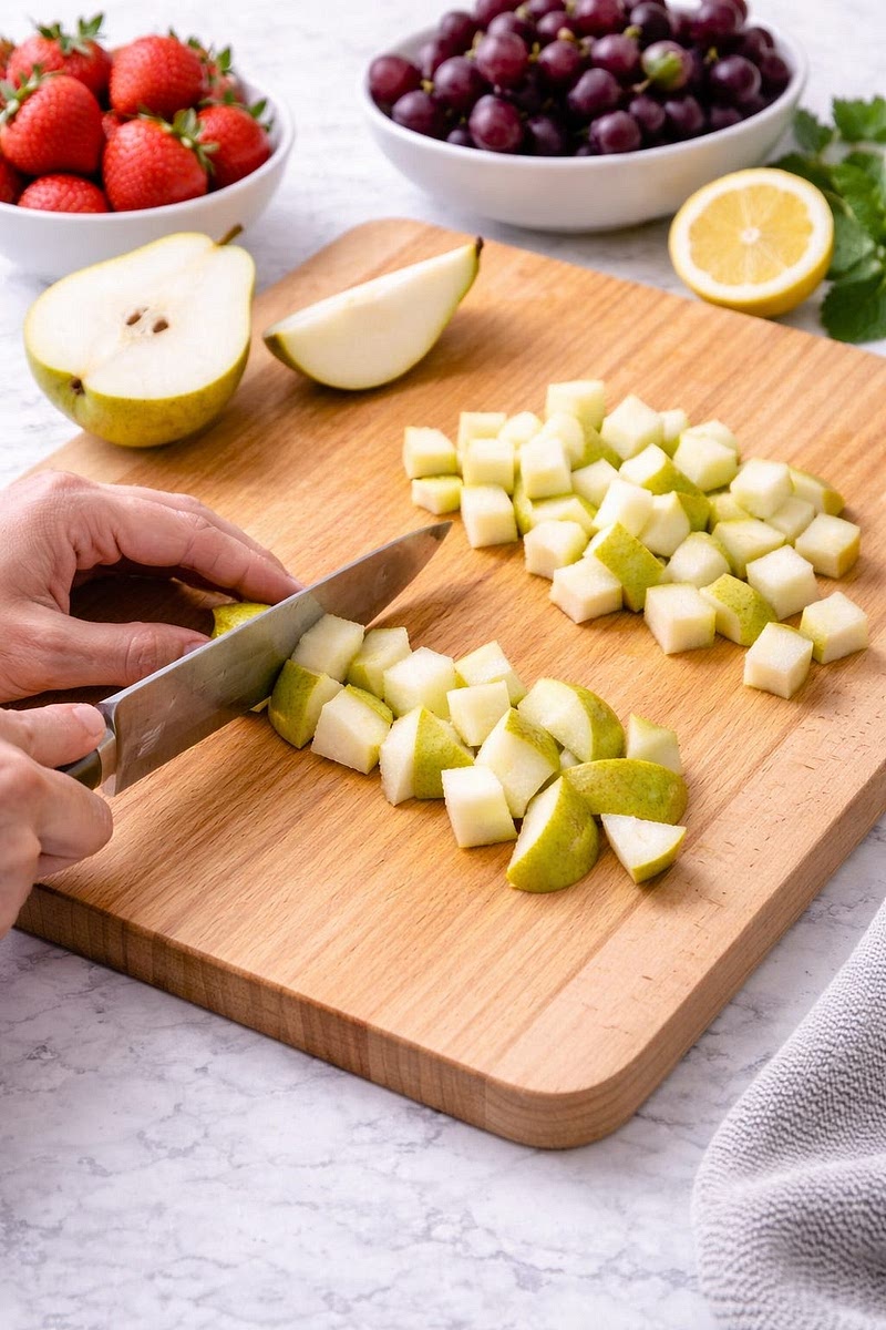 Cut the pear into small pieces.