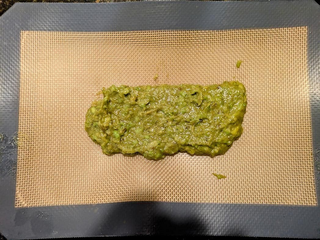 Line a plate with parchment paper. Using kitchen gloves (it's very sticky; you'll need them), shape the mixture into a rectangle. Freeze for 1 hour to harden