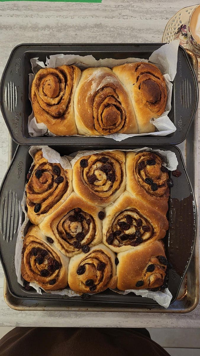 Place a cookie sheet under the baking dish. Bake on the middle-low rack at 375°F (325°F in my oven) for 35 - 45 min. Remove once risen and golden brown on top. Allow to cool for just 5 minutes. Place an inverted cookie sheet on top of the pan, flip and leave the baking pan on top of the buns to allow the caramel to drip and cool (≈ 5min). Scrape remaining caramel out of the pan and spread onto the buns. Enjoy :) ♥️