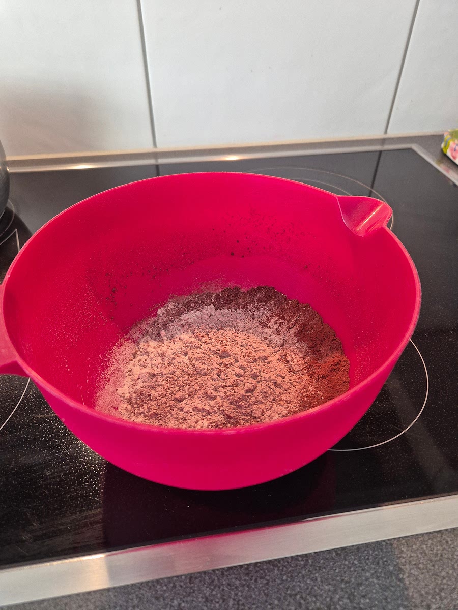 Sift the plain flour, ground almonds, and cocoa powder into a bowl.