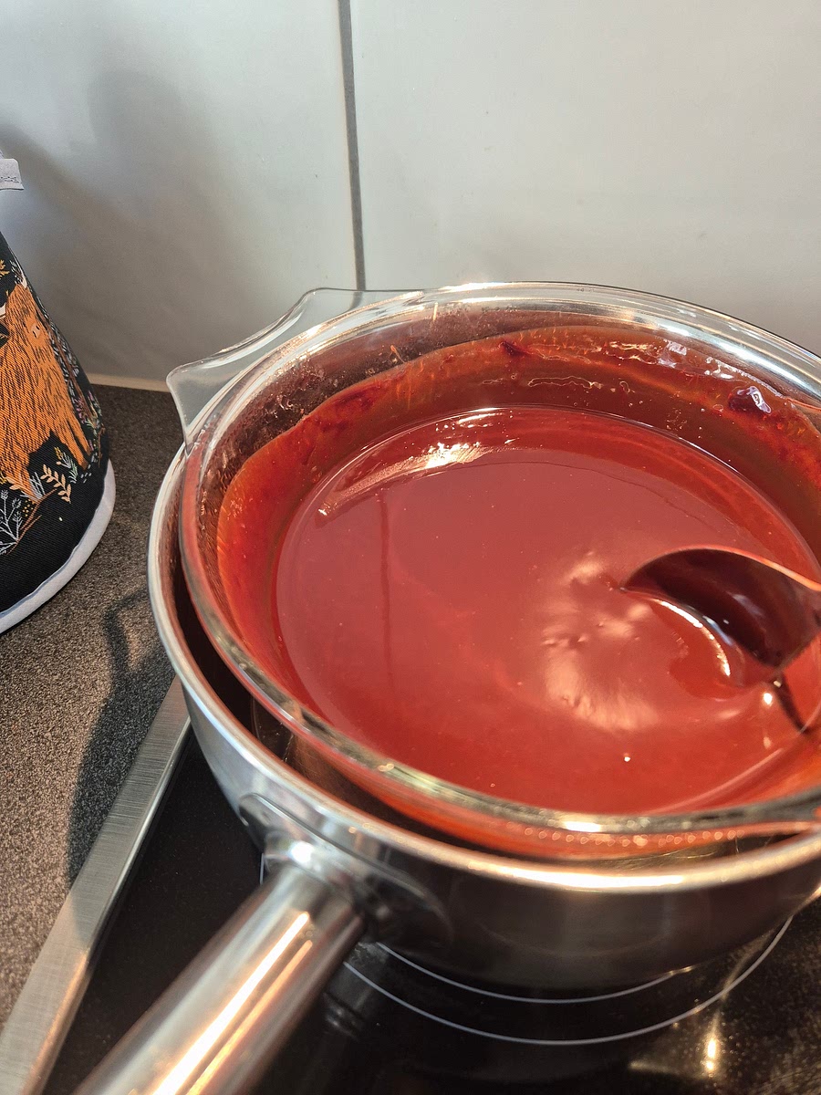 Melt the butter and dark chocolate gently together in a saucepan over low heat. Stir until smooth, then leave to cool slightly.