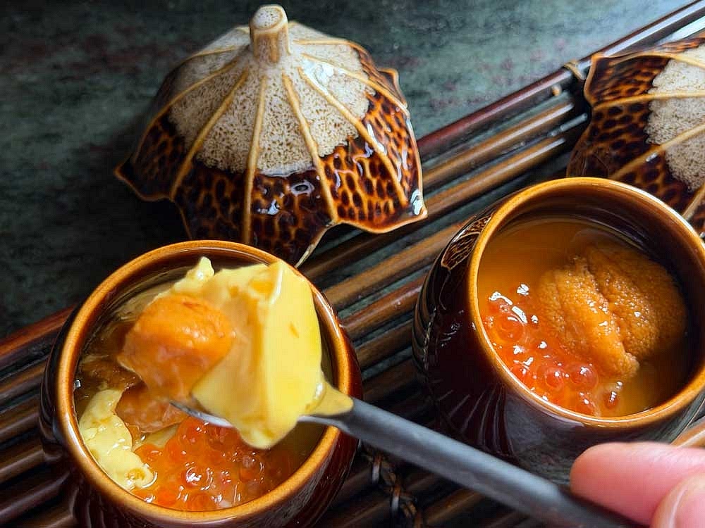 Remove the cups from the pot and carefully remove the plastic wrap. Pour some sauce on top of the cooked custard and arrange other toppings. Save hot, warm, or cold.