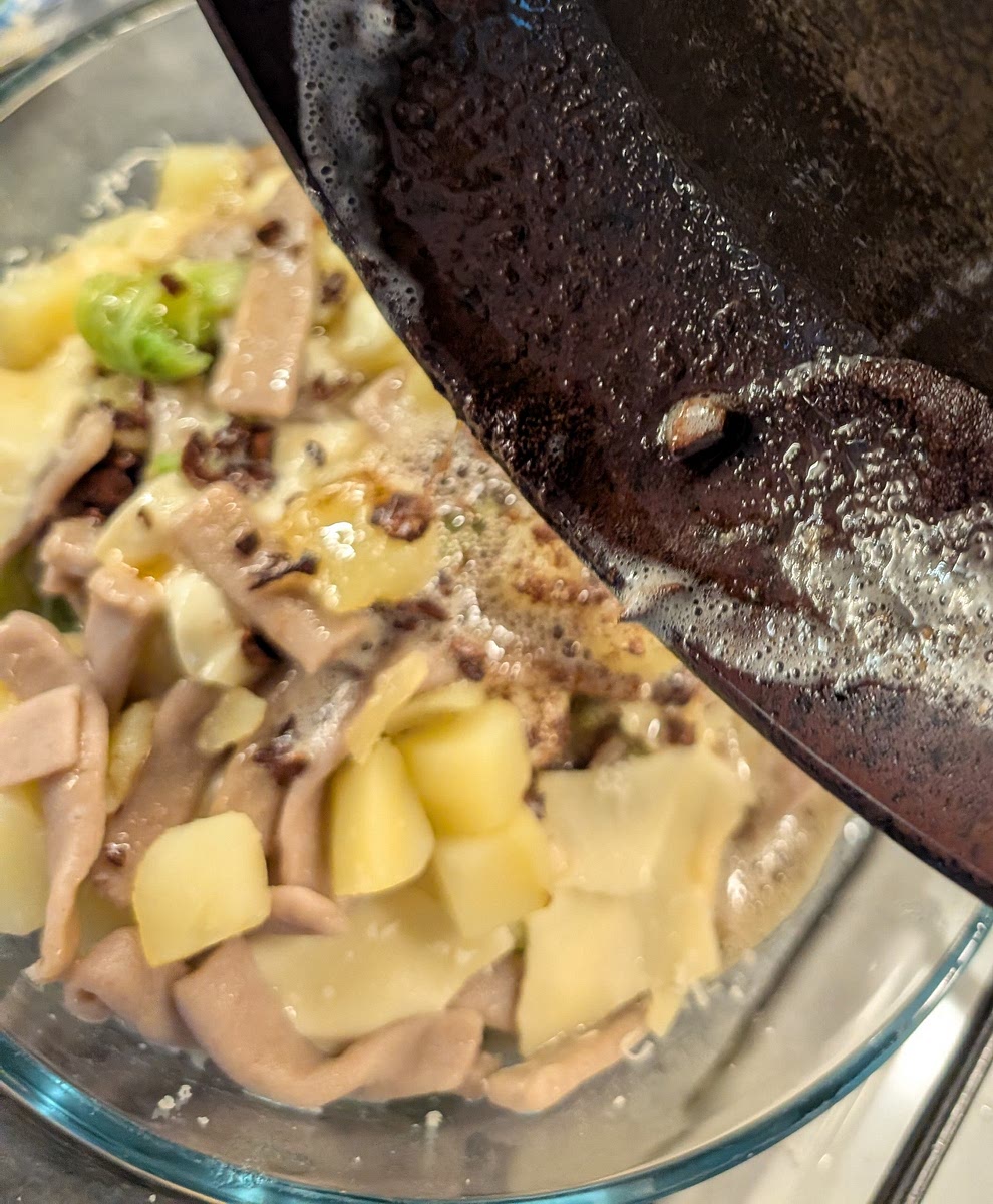 Add the piping hot golden garlic butter on top and serve right away, serving from the bottom of the dish to get all layers and loads of stringy cheese on the plate.