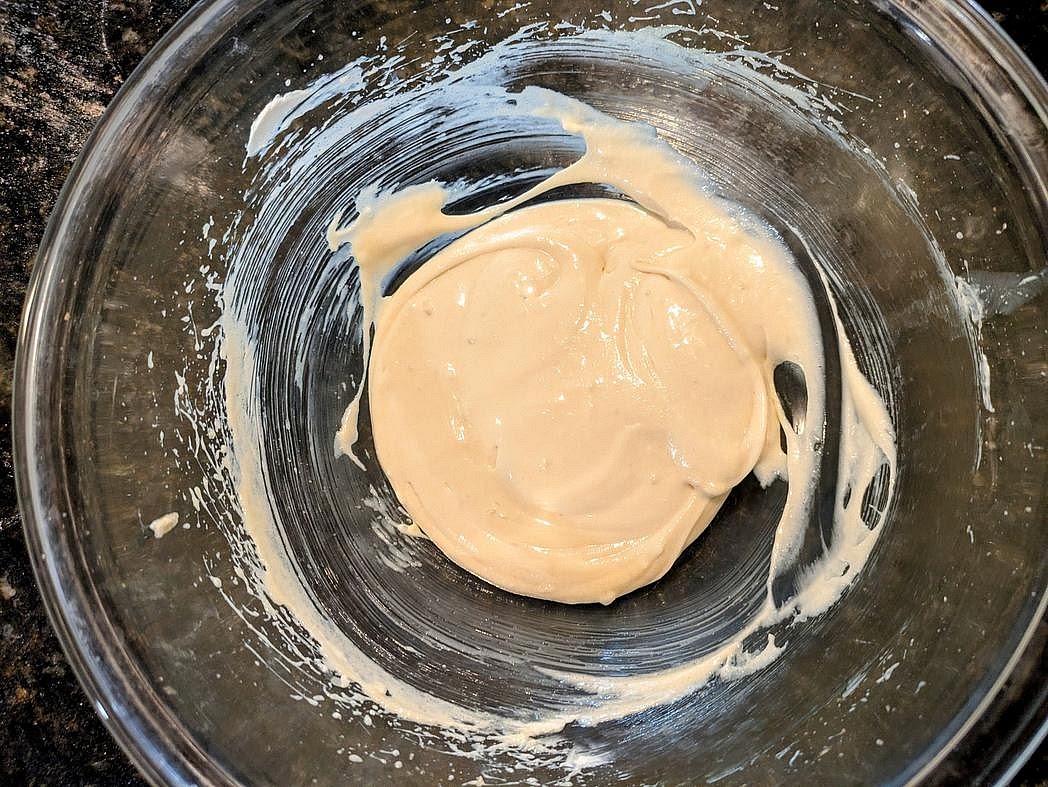 In a large bowl, add (softened) cream cheese, sugar, vanilla, and salt. Beat together the frosting ingredients with an electric hand mixer on medium speed until fully combined, about 2 minutes