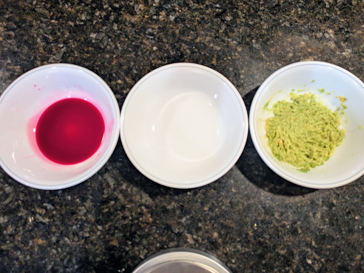 Prepare 3 medium bowls in a line. From left to right, these are your red, white, and green layers. Add pickled beet juice to the bowl on the left. Mash your avocado with the back of a fork on the bowl on the right.