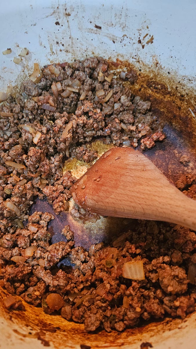 Add tomato paste → cook 1–2 mins If using chilli powder and cumin add it just before the tomato paste.