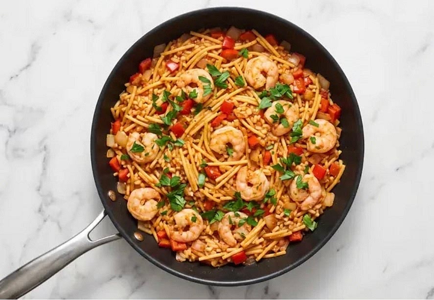 Rinse shrimp* under cold water, then pat dry with paper towels. When fideuà has 5 minutes left, add shrimp to pan; cook, stirring occasionally, until shrimp are opaque and fully cooked through. Turn off heat; stir in half the parsley. Taste and season with salt and pepper. TIP: Fideuà should be a similar consistency to risotto. If too thick, add a splash of hot water.