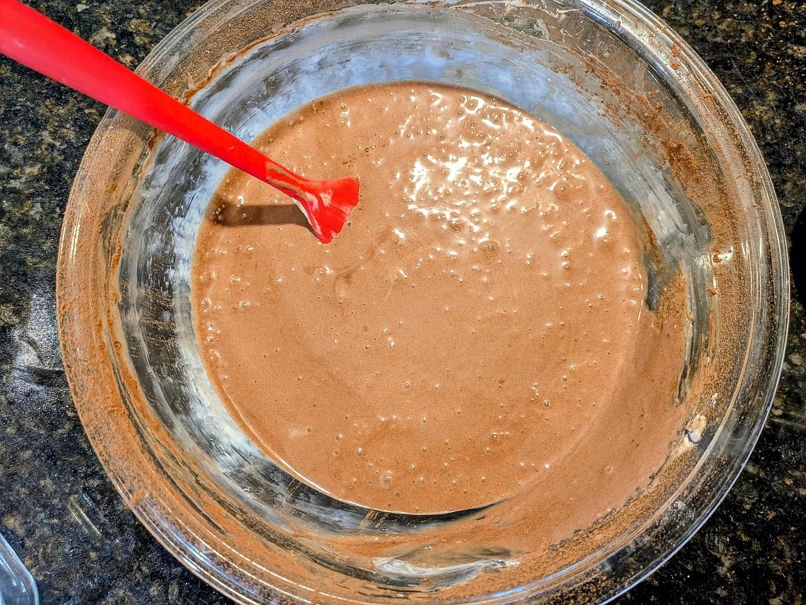 Add the cocoa powder to the bowl, and beat on medium speed until fully incorporated