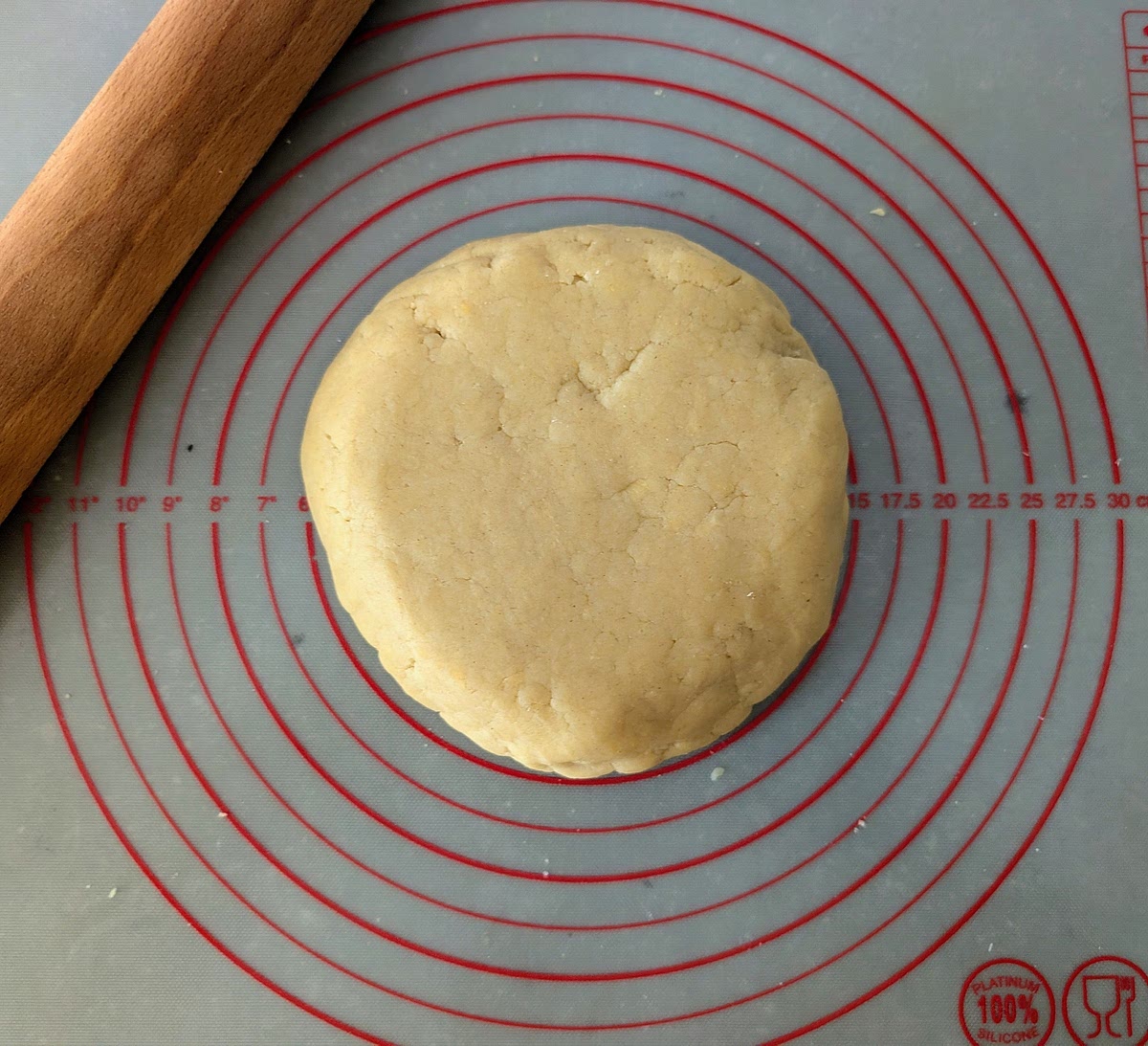 Turn out the dough and push it together with your hands, shaping it into a puck. Don’t be tempted to knead the pastry, as this will develop the gluten and affect the desired crumbly texture.