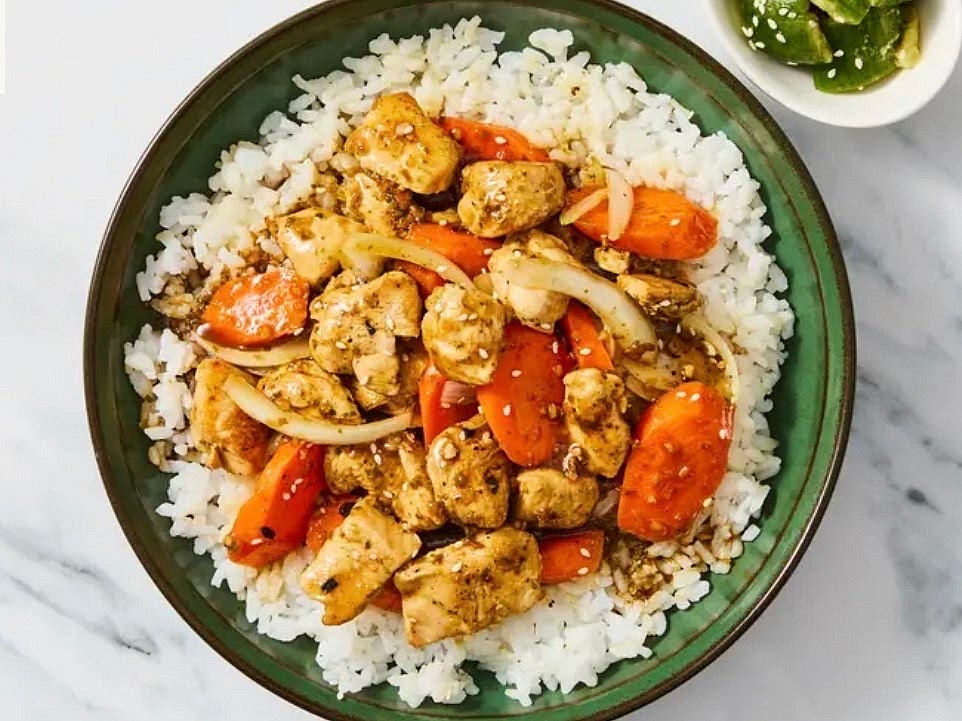 Divide rice and chicken curry between shallow bowls in separate sections. Garnish with scallion greens and half the sesame seeds. Serve marinated cucumber salad on the side and garnish with remaining sesame seeds.