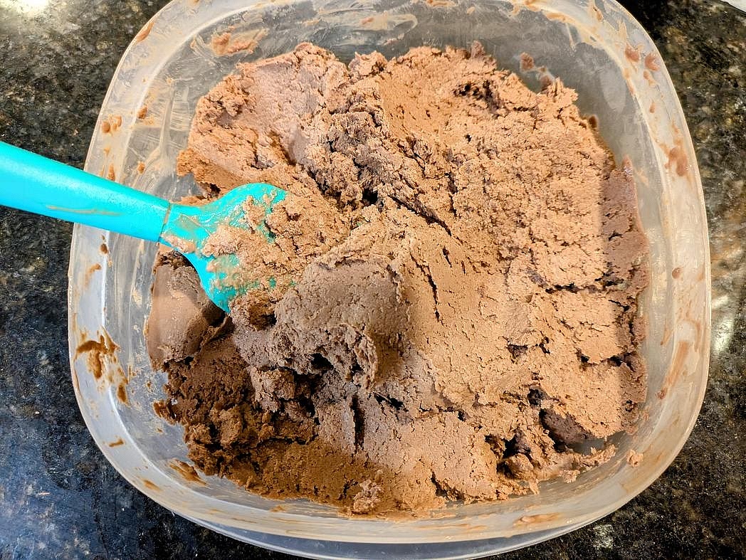 Every half an hour, churn the fro-yo by mixing with a silicone spatula. Do this 6 times for a total of 3 hours